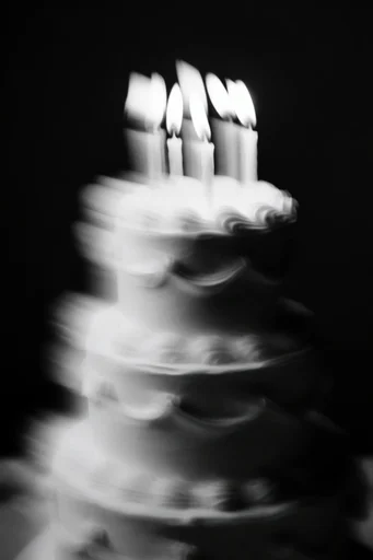 Kinetic Spectral Monochrome style reference image — minimalist dark composition