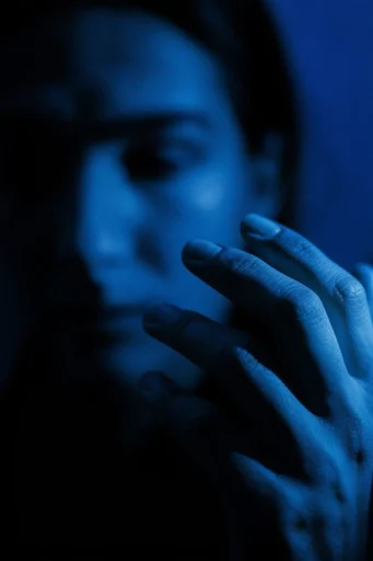 Electric Cobalt Noir style reference image — dramatic side-lighting