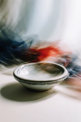 Kinetic Ethereal Motion style reference image — shutter drag