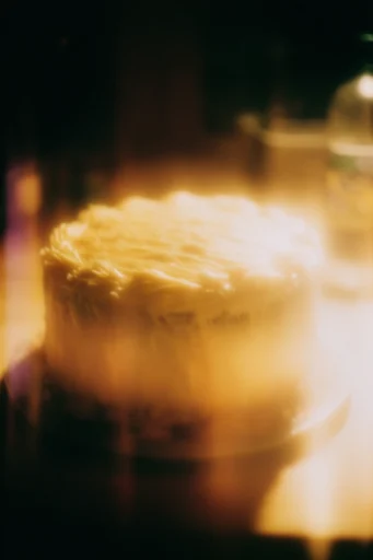 Cinematic Amber Nocturne style reference image — soft focus atmosphere
