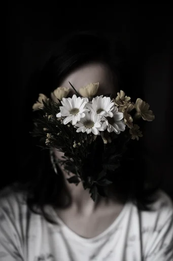 Cinematic Chiaroscuro Intimacy style reference image — shallow depth of field
