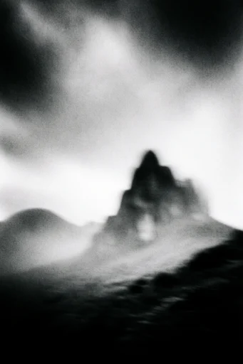 Ethereal Noir Grain style reference image — heavy film grain