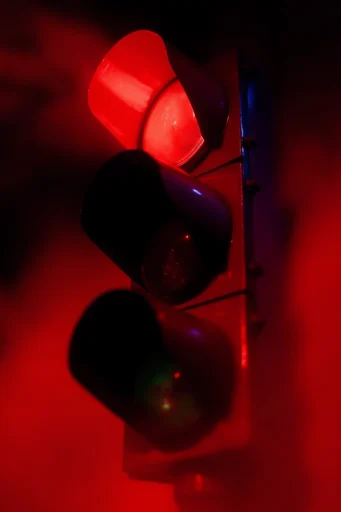 Crimson Noir Surrealism style reference image — saturated crimson red