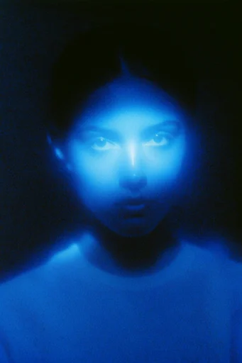 Ethereal Bioluminescent Noir style reference image — chiaroscuro