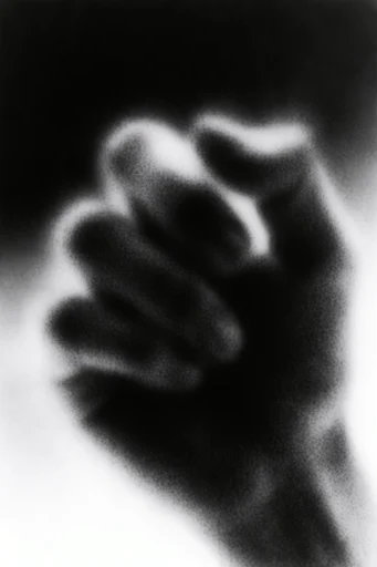 Gritty Monochromatic Noir style reference image — chiaroscuro lighting