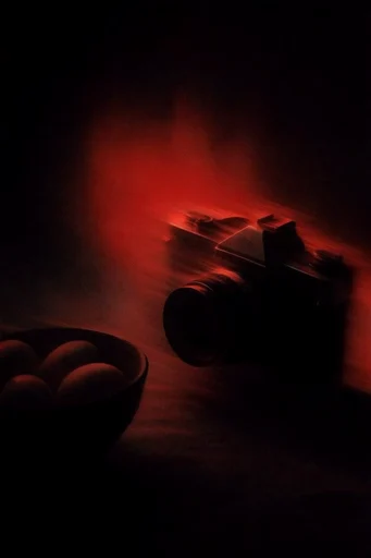 Crimson Noir Dreamscape style reference image — saturated crimson glow