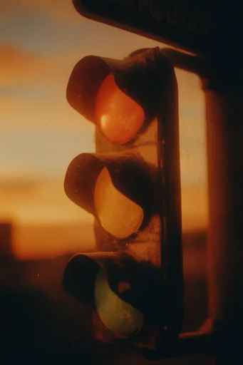 Nostalgic Amber Dreamscape style reference image — analog film grain