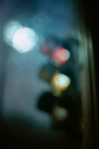 Ethereal Nocturnal Blur style reference image — heavy analog film grain