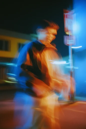 Kinetic Nocturnal Amber style reference image — long exposure motion blur