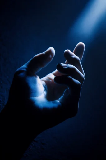 Bioluminescent Abyssal Noir style reference image — chiaroscuro silhouette