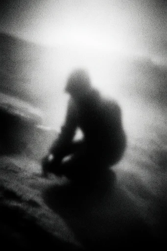 Atmospheric Monochrome Grain moodboard — generate AI images in this style