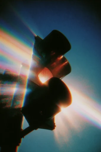 Prismatic Retro Dreamscape style reference image — vintage analog film grain