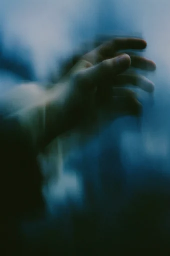 Cinematic Urban Melancholy style reference image — urban isolation