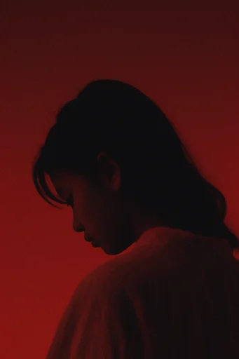 Crimson Dystopian Minimalism style reference image — cinematic film grain