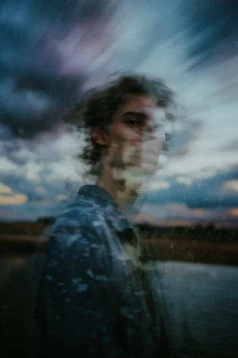 Ethereal Fragmented Melancholy style reference image — motion blur