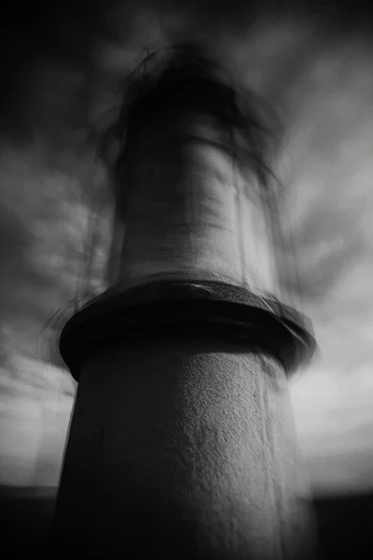 Cinematic Monochrome Surrealism style reference image — cinematic motion blur