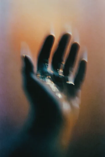 Ethereal Analog Nostalgia style reference image — moody teal and amber palette
