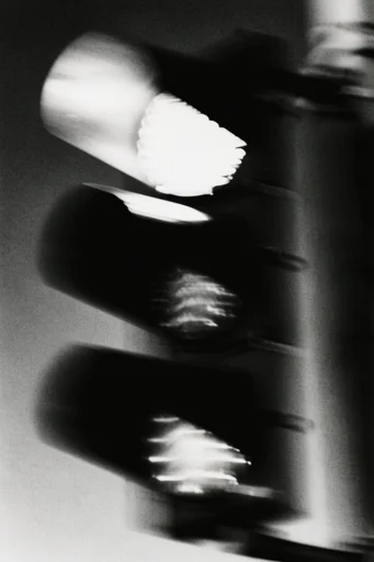 Kinetic Spectral Noir style reference image — heavy film grain