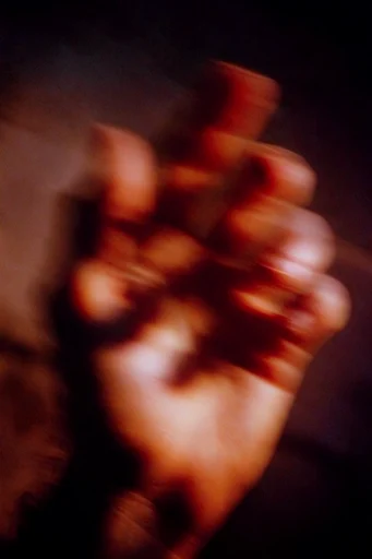 Crimson Nocturnal Blur style reference image — crimson and amber palette