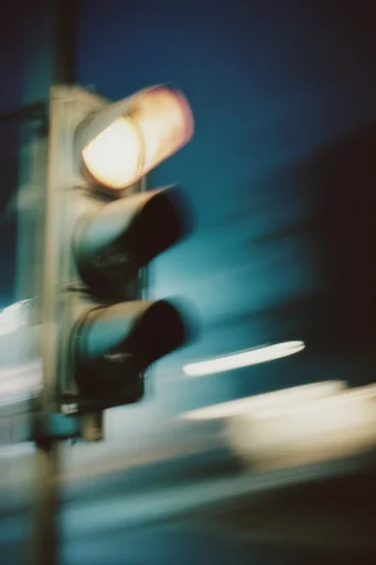 Nocturnal Cinematic Blur style reference image — analog film grain
