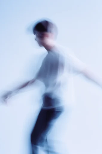 Ethereal Kinetic Motion style reference image — abstract silhouette