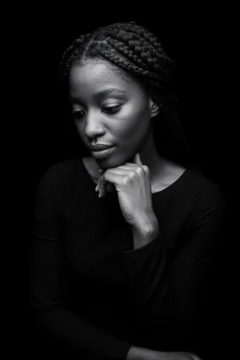 Cinematic Chiaroscuro Noir style reference image — dramatic shadows