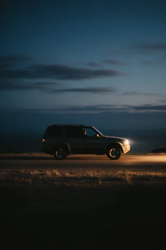 Cinematic Nocturnal Solitude style reference image — isolated vehicle