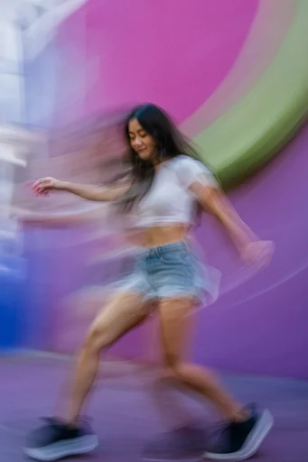 Ethereal Kinetic Iridescence style reference image — intentional motion blur
