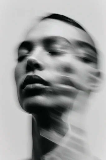 Kinetic Ghostly Monochrome style reference image — minimalist studio background
