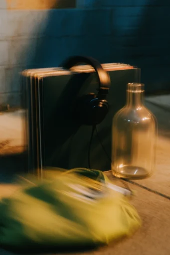Cinematic Nocturnal Transit style reference image — warm amber lighting
