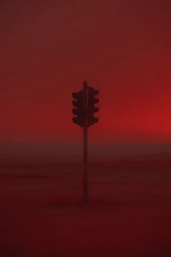 Crimson Dystopian Minimalism style reference image — atmospheric red haze