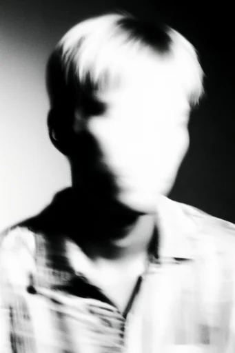 Spectral Luminescent Noir style reference image — ethereal motion blur