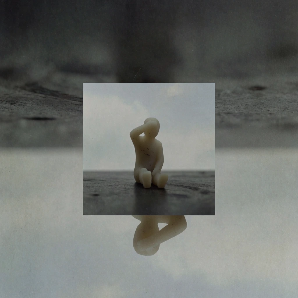 minimalist surrealist composition, seated clay figurine with arm raised to head, horizontal line dividing frame into dark textured upper half and light atmospheric lower half, central square inset swapping textures and subjects between quadrants for a geometric optical illusion, moody desaturated palette of slate grey and charcoal, grainy film texture, soft diffused lighting, conceptual art photography style, low contrast, ethereal, experimental.