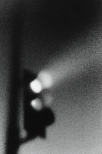 Ethereal Noir Kineticism style reference image — extreme chiaroscuro