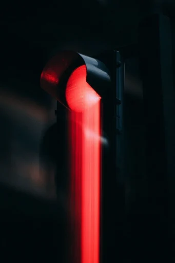 Cinematic Noir Glitch style reference image — minimalist negative space