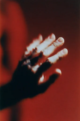 Crimson Noir Surrealism style reference image — ethereal smoke and motion blur