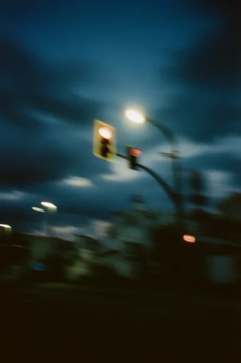 Ethereal Motion Noir style reference image — heavy film grain