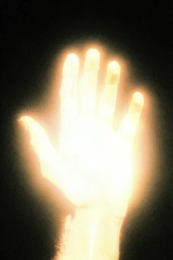 Ethereal Spectral Chiaroscuro style reference image — ethereal light bloom