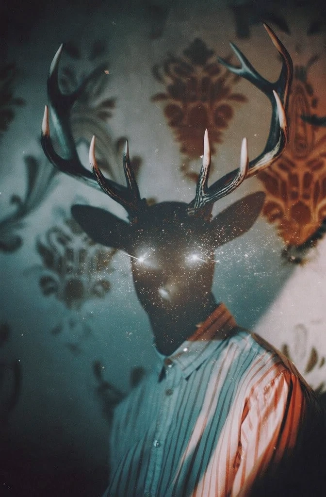 dark antlered silhouette with two piercing pin-light eyes, set against a faded vintage damask wallpaper, moody cinematic color grading with deep teal shadows and desaturated midtones, soft-focus low-key lighting, heavy organic film grain, ethereal floating dust motes and micro-glitter particles caught in light, shallow depth of field, dreamlike melancholic atmosphere, intimate framing, textured indie film aesthetic, ethereal magical realism.