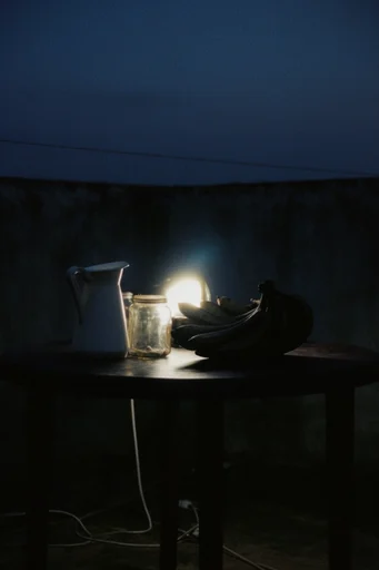 Cinematic Nocturnal Melancholia style reference image — analog film grain