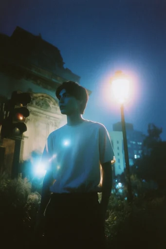 Ethereal Nocturnal Luminescence style reference image — analog film grain