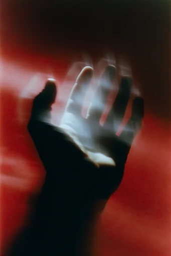 Crimson Cinematic Surrealism style reference image — cinematic film grain