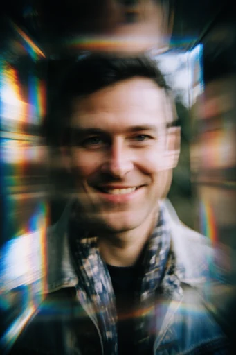 Ethereal Prismatic Refraction style reference image — shimmering bokeh