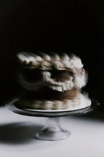 Ethereal Chiaroscuro Motion style reference image — sepia tones