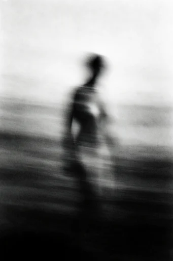 Kinetic Noir Abstraction style reference image — heavy film grain