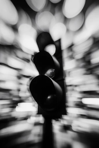 Ethereal Noir Abstraction style reference image — heavy film grain