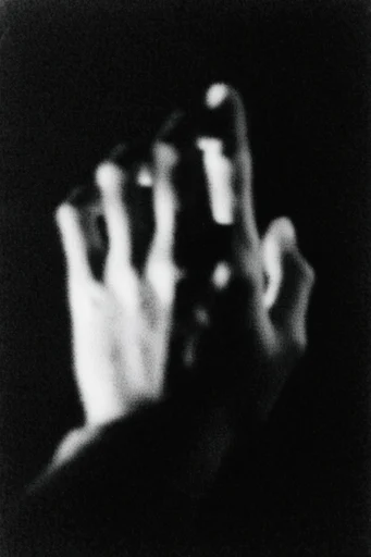 Spectral Noir Motion style reference image — heavy film grain