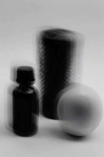 Monochrome Surrealist Duality style reference image — high-contrast monochrome photography