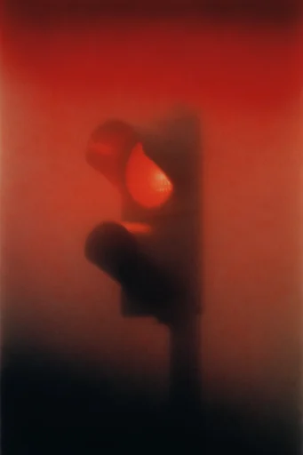 Crimson Spectral Noir style reference image — analog film grain