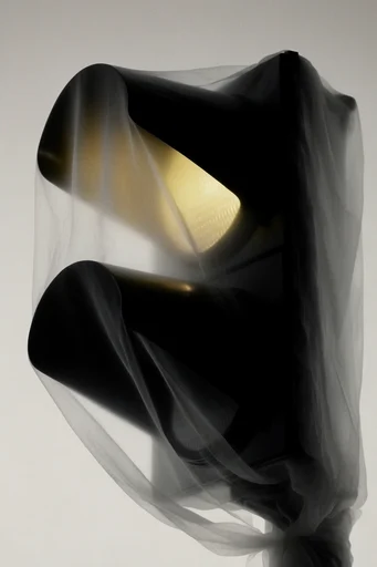 Ethereal Sculptural Minimalism style reference image — sculptural fabric drapery